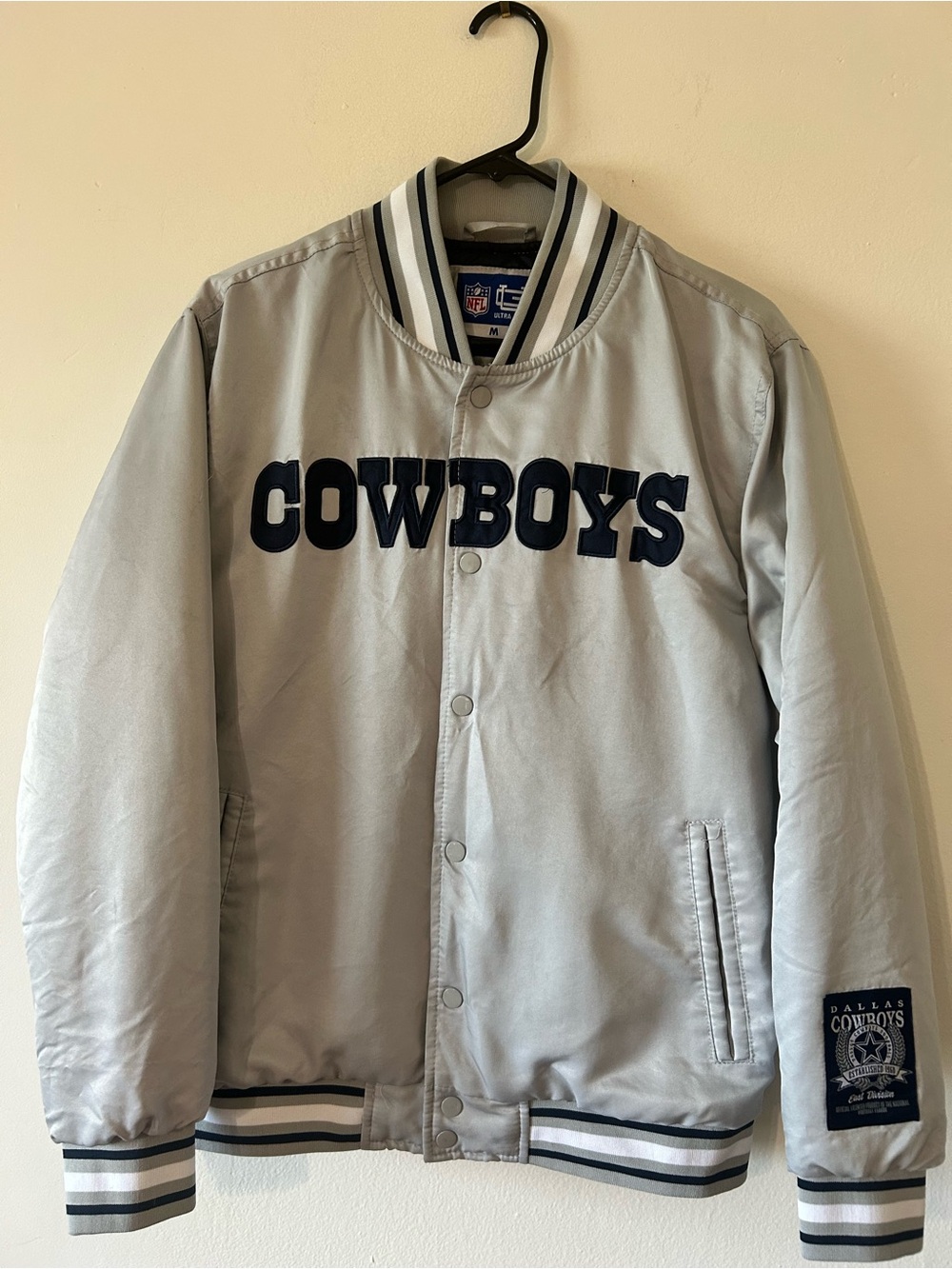 NFL Dallas Cowboys Light Gray Satin Varsity Jacket with Navy Lettering